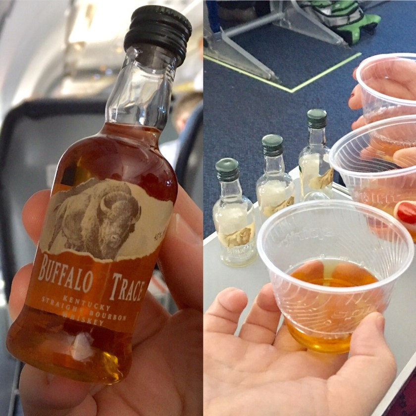 Three glasses of whisky clink in airline cups. Inset: A mini-bottle of Buffalo Trace Kentucky Straight Bourbon. 